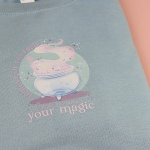 Enchanted Wands & Wishes - 'Believe in yourself' Glass Cauldron illustrated sweater -BLUE
