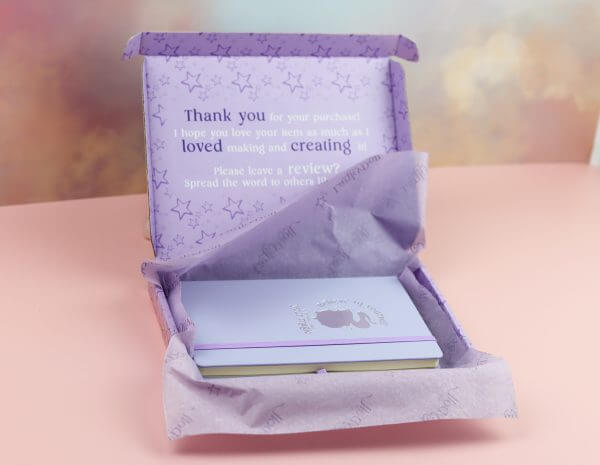 Gift wrapped in illustrated box & branded tissue paper and sticker - Image 4